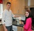 The kitchen of Wilson and Frankie’s home includes integrated top brand name appliances.