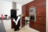 Mary loves her new kitchen.