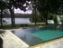 The pool and river view at Villa Apsara
