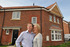 Ron and Vanda Miller outside their new Redrow home at Saxon Court.