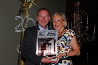 Weston Homes Head of Sales Jonathan Lewis with the award for Hawkins Wharf