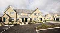 A street scene of new Redrow homes at Wheatley Chase, Halifax.