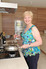 Downsizer Judith Sampson relaxes in her new Redrow home at Loves Farm, St Neots.