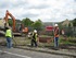 The Redrow team cement their friendship with neighbours Pennine Magpie by helping to build a wall.