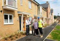 left to right Sales Negotiator Sean McIntyre, John and Queenie Greetham and Site manager Stuart Knight