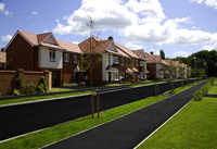 A typical street scene at Taylor Wimpey’s highly sought after Hinchley Park development in Esher, Surrey.