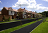 A typical street scene at Taylor Wimpey’s highly sought after Hinchley Park development in Esher, Surrey.