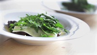 Open Dark Chocolate Venison Ravioli with Herb Salad