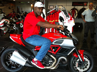 Boxing legend Evander Holyfield visits Ducati Manchester