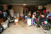Garage no more - clutter leaves car on the street