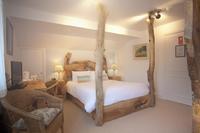 One of Cottage Lodge's beautiful hand-made beds