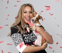 Leona Lewis and her dog celebrate a milestone in animal rights