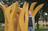 Sculptor John Merrill with his sculpture, Copse