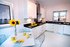 A contemporary kitchen and living area