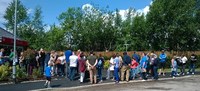 Would-be home owners queue outside Redrow’s sales office at Woodland View, Prestwich. 