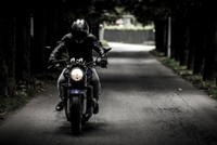 Why do some prefer motorcycles over cars? 