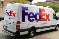 What should you do if your vehicle is hit by a FedEx truck? 